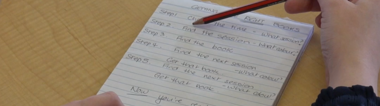 Notepad with a list of steps written down